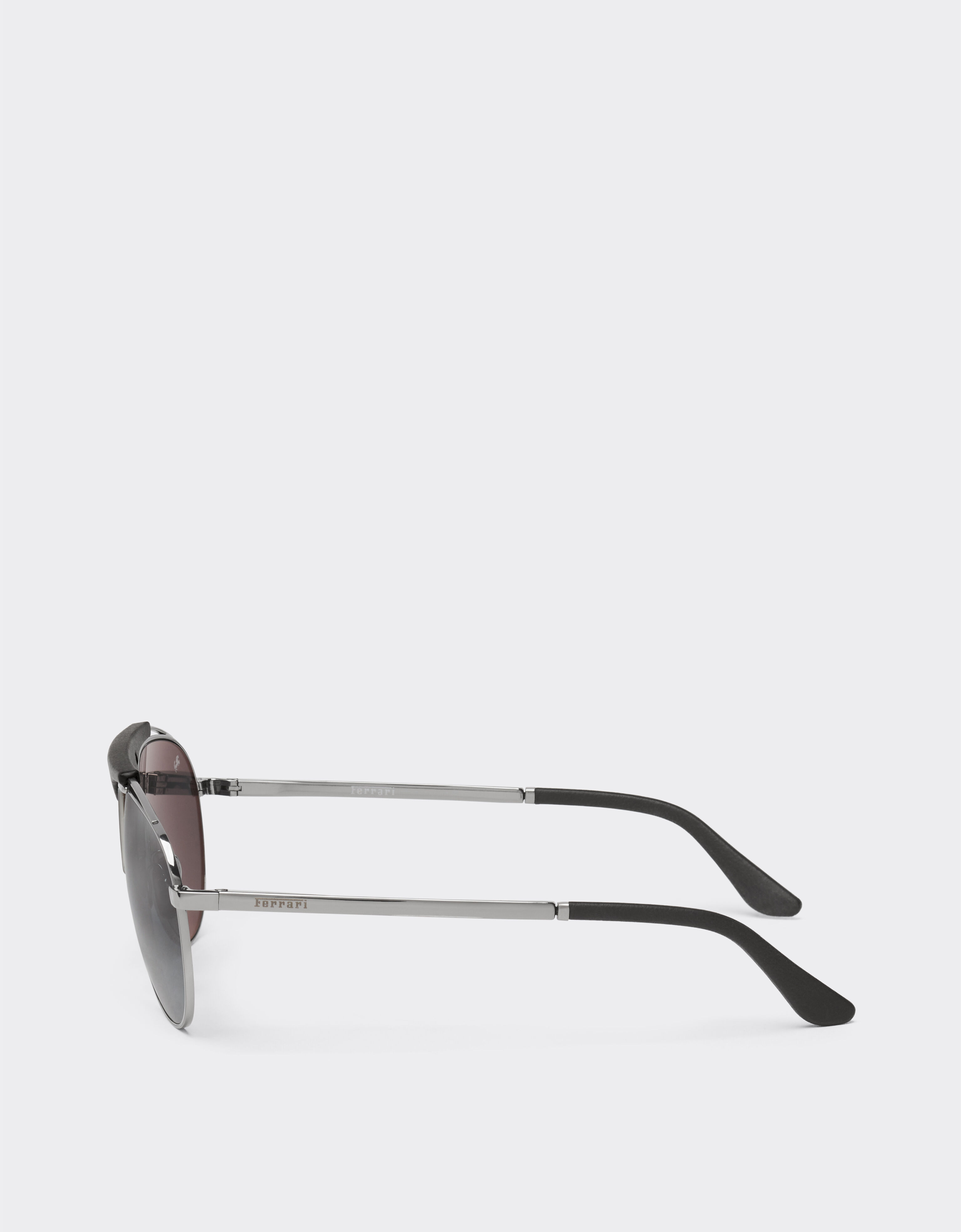 Ferrari Ferrari sunglasses in gunmetal grey metal and leather with blue lenses Ingrid LA02Ff