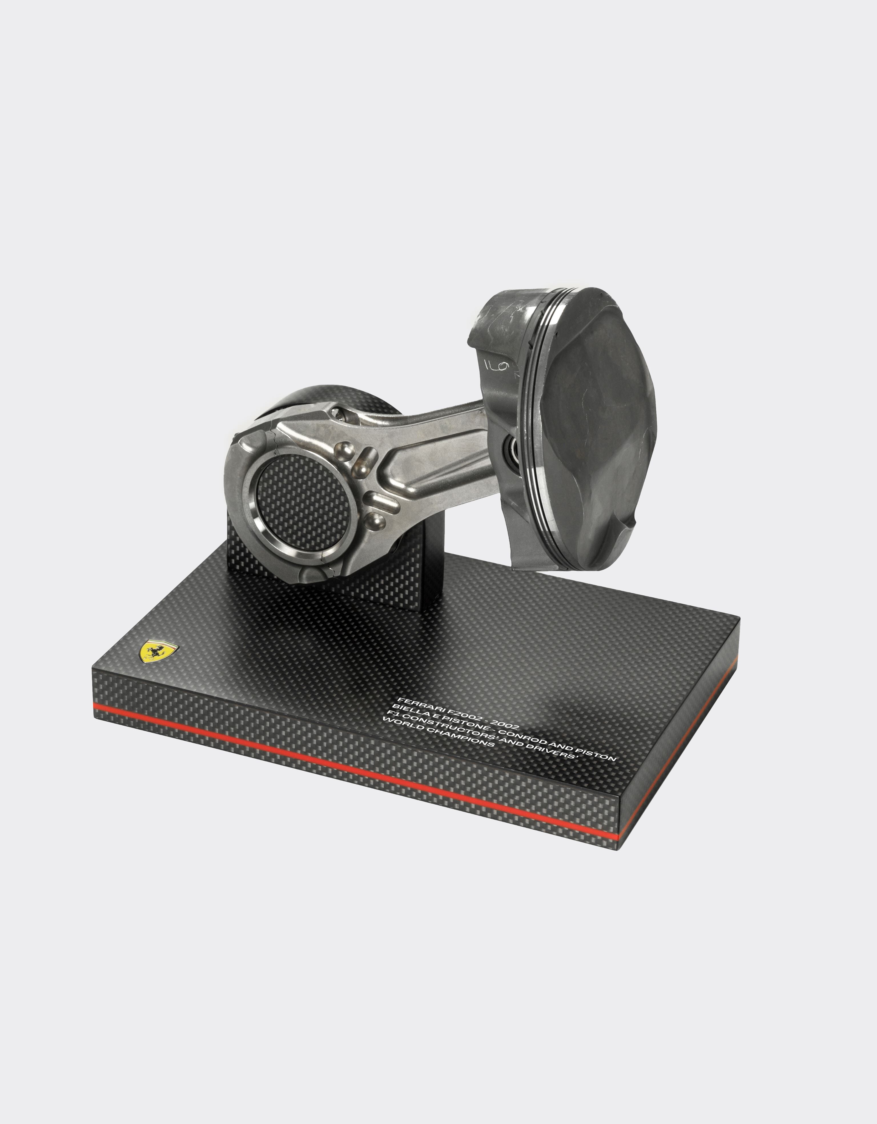 Ferrari Original connecting rod and piston set from the F2002, winner of the 2002 Constructors’ and Drivers’ Championships Rosso Corsa F0883f