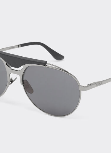 Ferrari Ferrari sunglasses in gunmetal grey metal and leather with blue lenses Ingrid LA02Ff