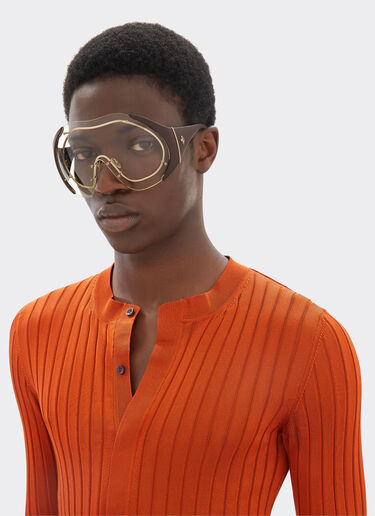 Sonnenbrille aus goldenem Metall und braunem Leder mit transparentem Rahmen Ferrari Sonnenbrille aus goldenem Metall und braunem Leder mit transparentem Rahmen Beige LA01Nf