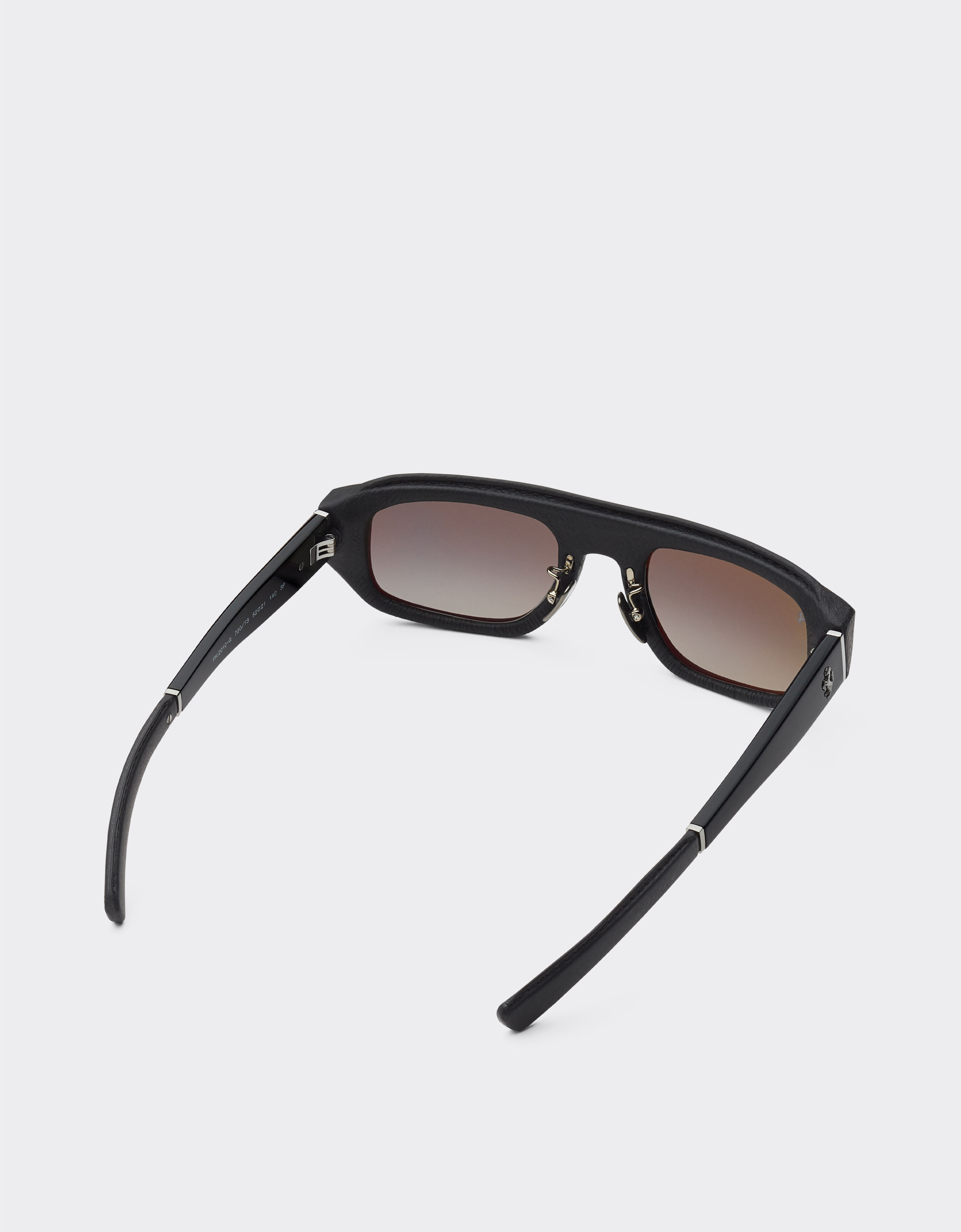 Ferrari Lunettes de soleil Ferrari en acétate et cuir noir avec verres polarisants grisés Noir F1541f