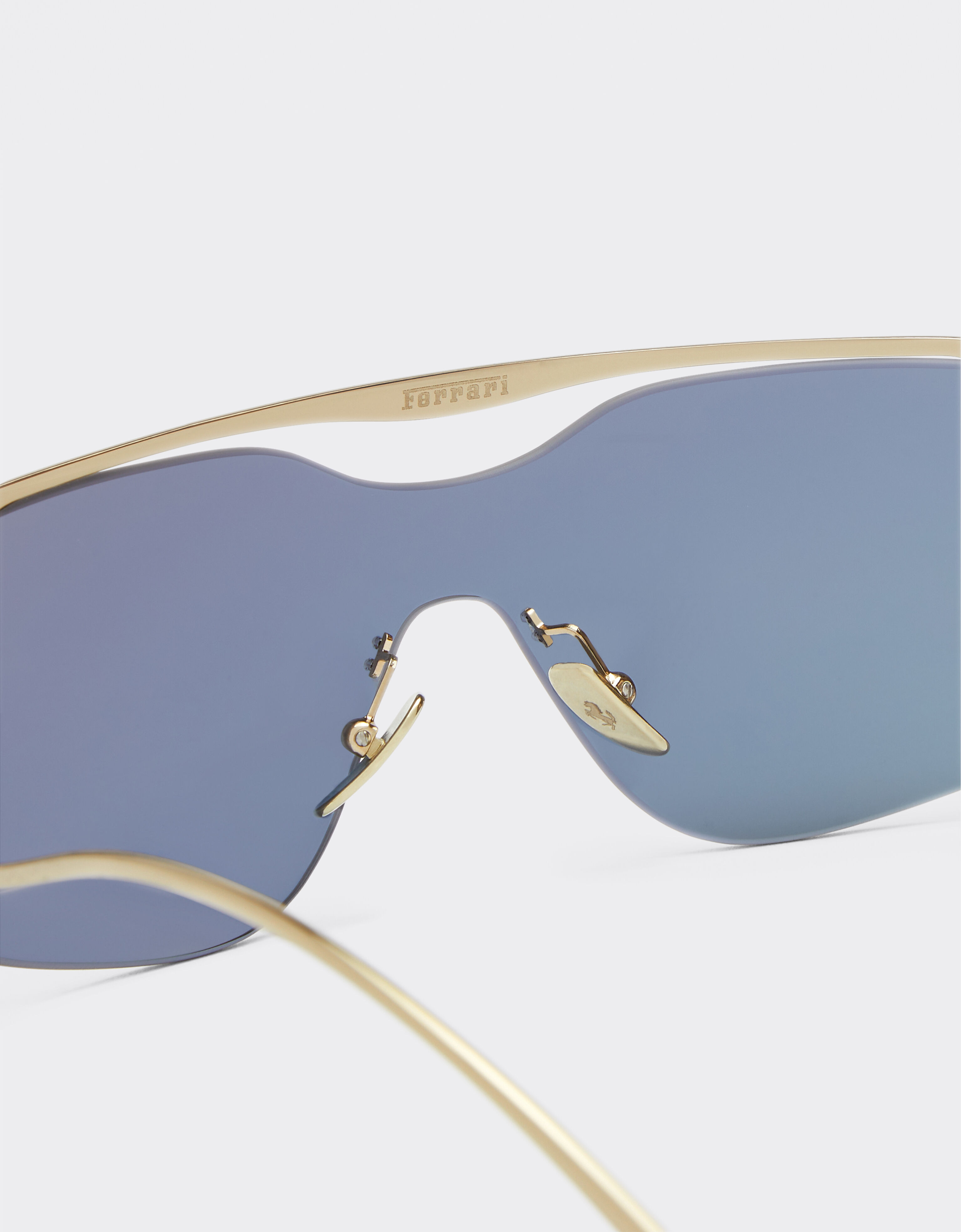 Ferrari Ferrari Sonnenbrille aus goldenem Metall mit gold-blau verspiegelten Gläsern Gold F1200f
