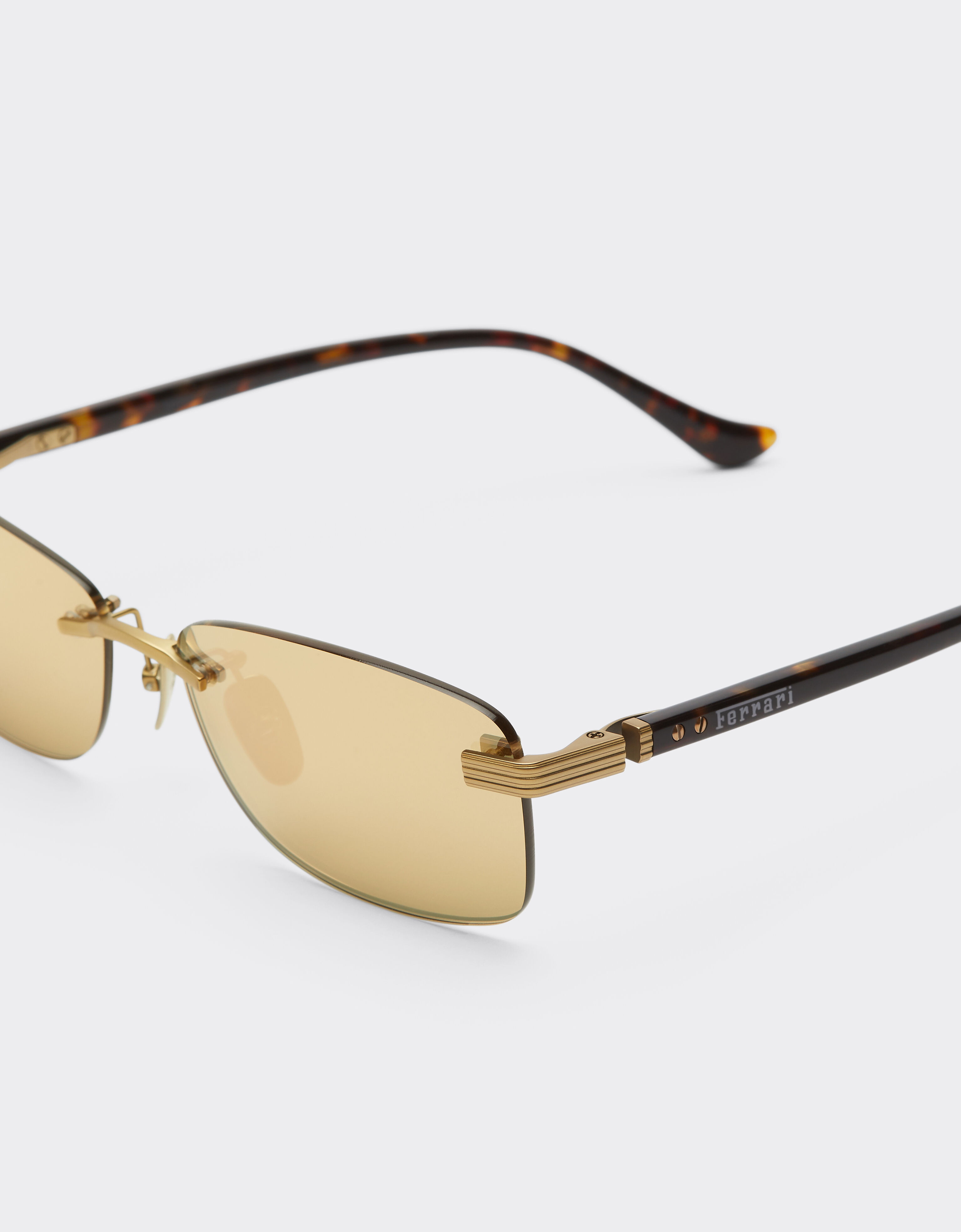 Ferrari Ferrari sunglasses in matte gold titanium and acetate with transparent gold mirrored lenses Oro LA0L9f