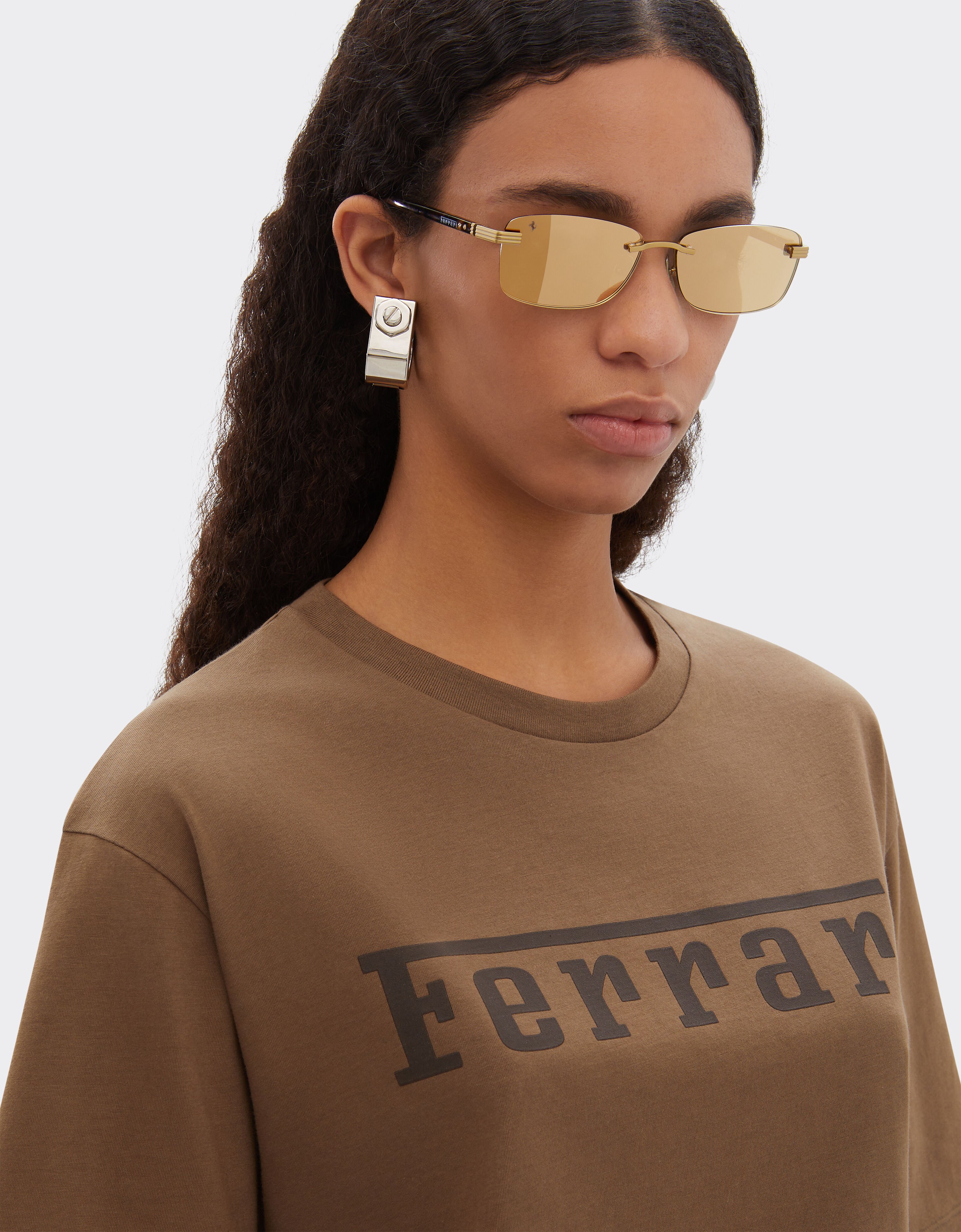 Lunettes de soleil Ferrari en titane doré mat et acétate avec verres jaune doré transparent miroir Ferrari Lunettes de soleil Ferrari en titane doré mat et acétate avec verres jaune doré transparent miroir Oro LA0L9f