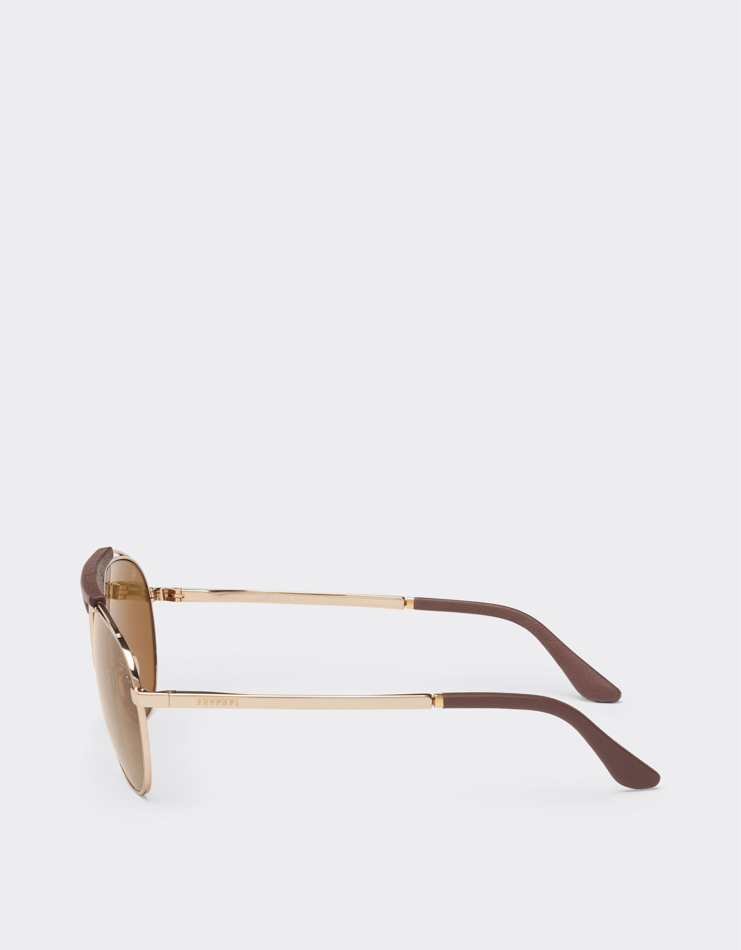 Ferrari Ferrari sunglasses in gold-tone metal and leather with polarised brown lenses Satin Gold LA02Ef