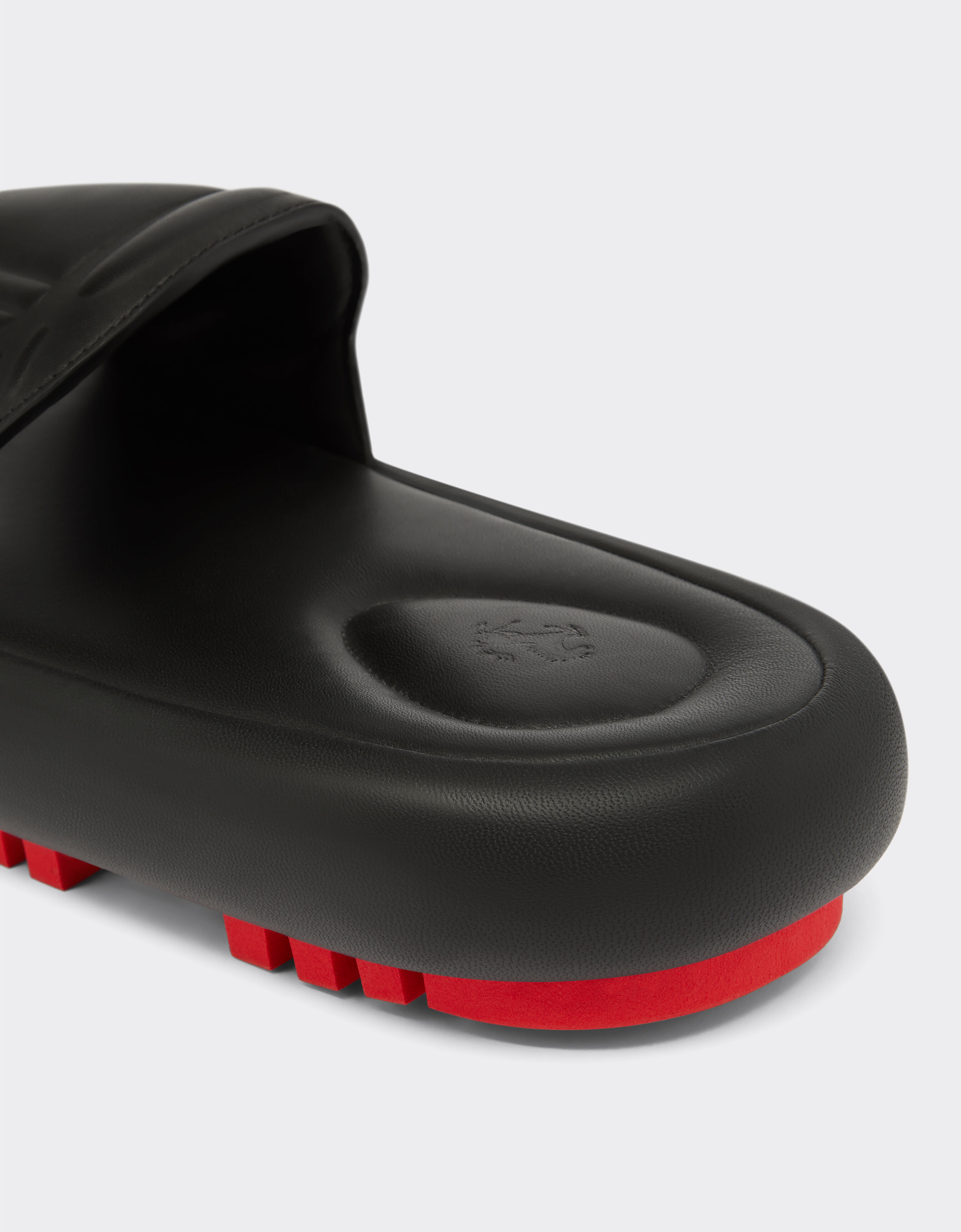 Slider sandals in rubberised leather in Black Ferrari