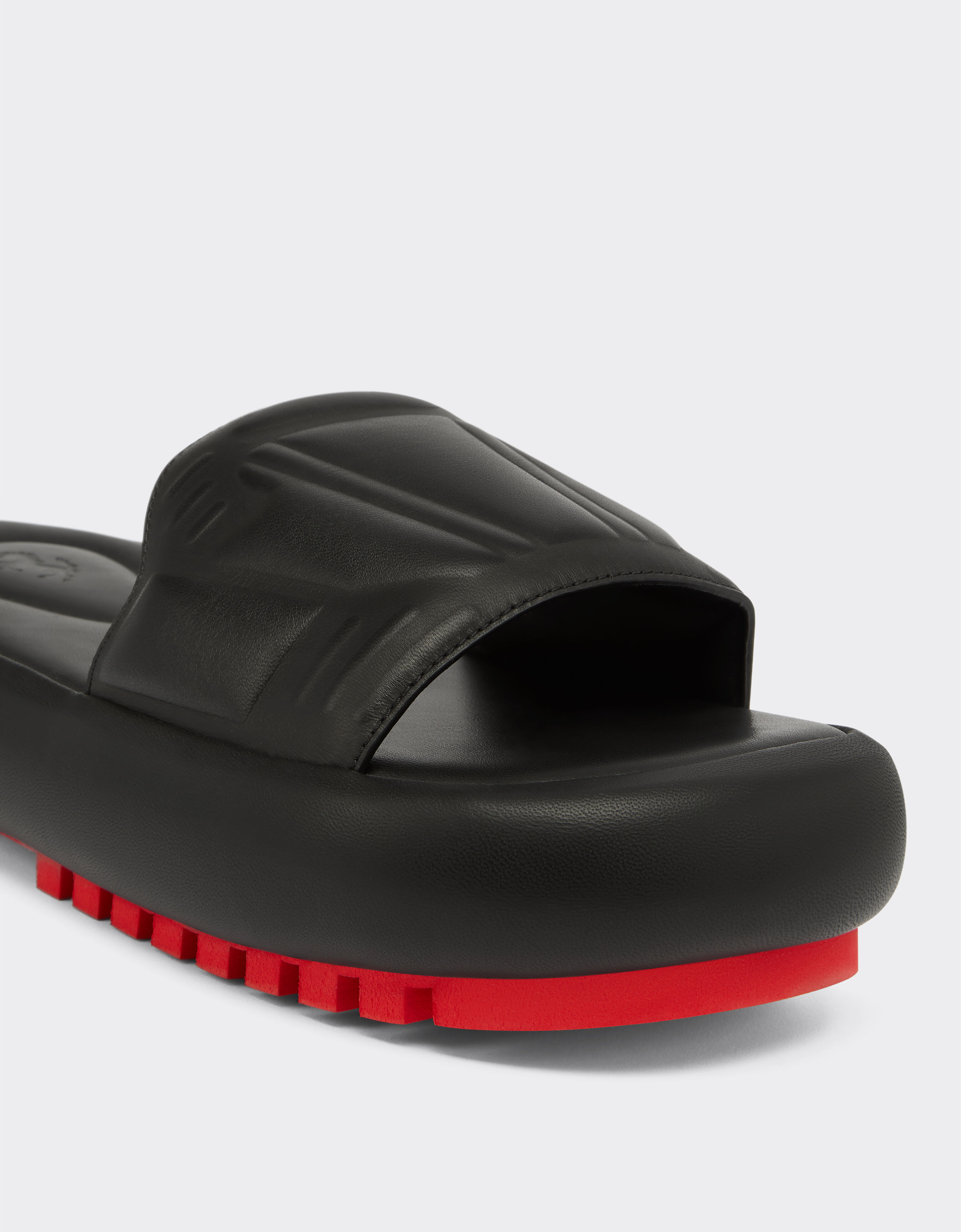 Slider sandals in rubberised leather in Black Ferrari