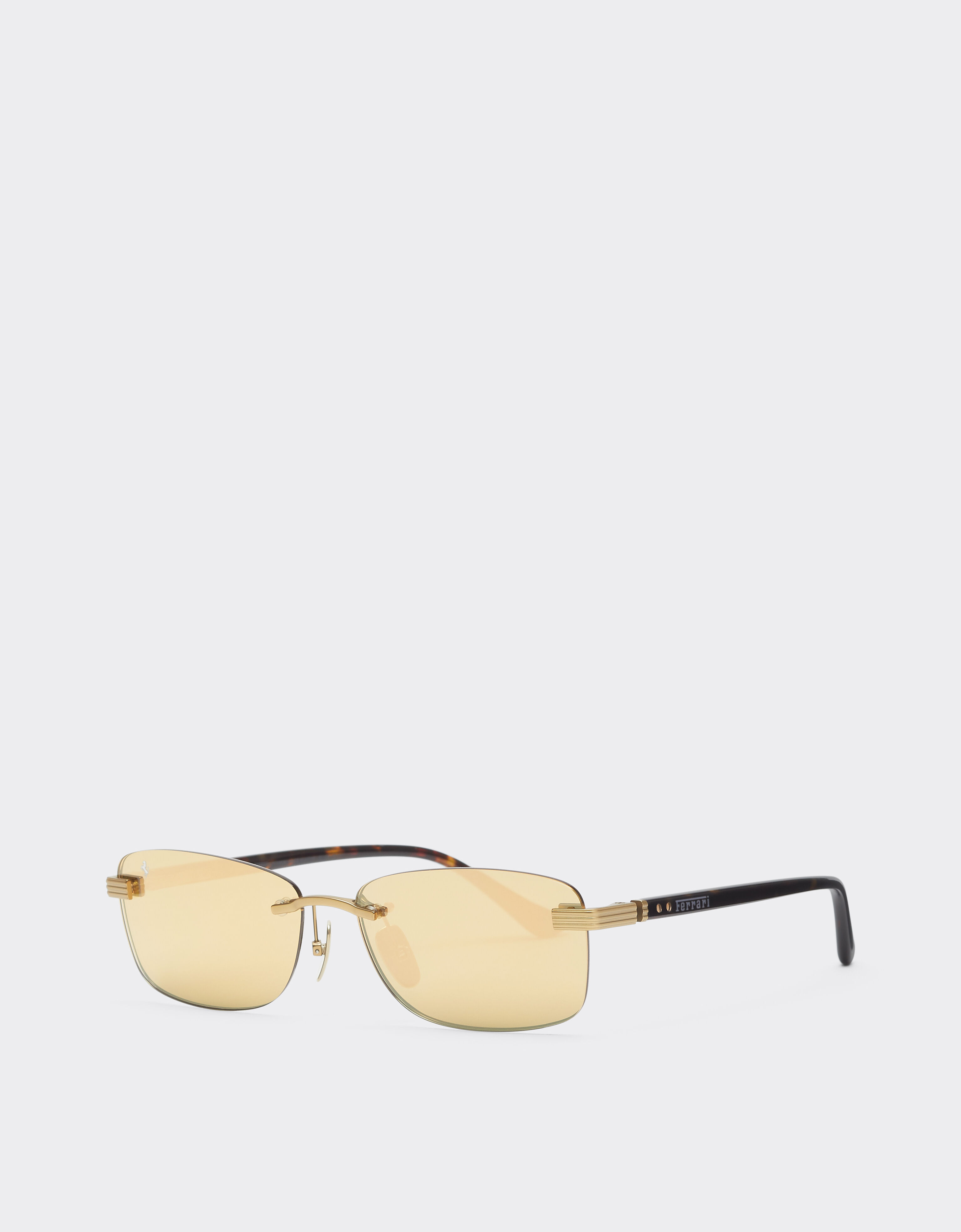 Lunettes de soleil Ferrari en titane doré mat et acétate avec verres jaune doré transparent miroir Ferrari Lunettes de soleil Ferrari en titane doré mat et acétate avec verres jaune doré transparent miroir Oro LA0L9f