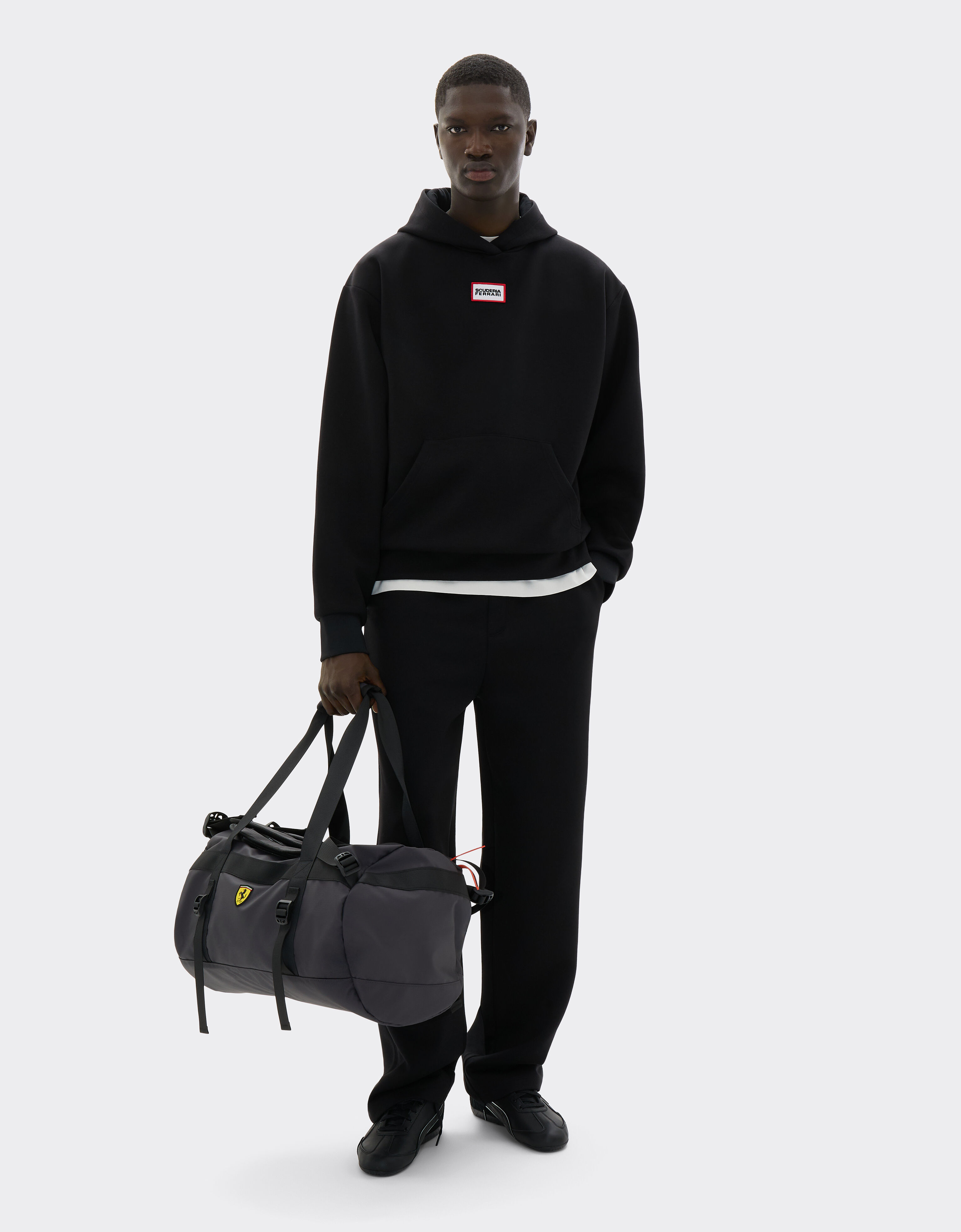 Duffle bag and backpack with Ferrari Scudetto