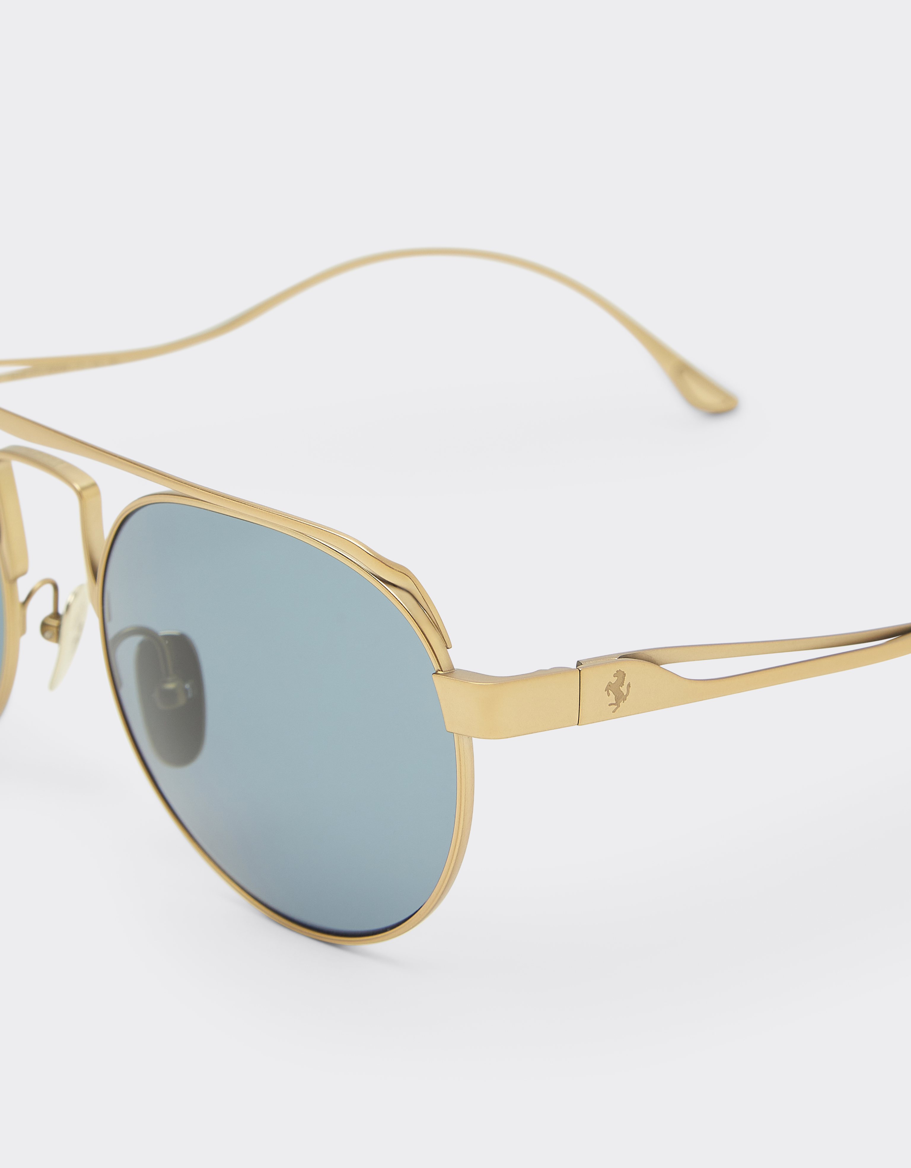 Ferrari Sunglasses In Matte Gold Titanium With Blue Lenses In Gray